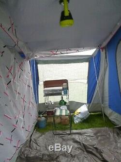 Tent. Large family tent with metal frame. Complete with electrical hook up